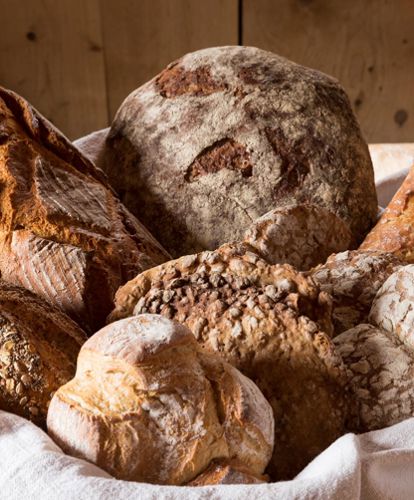 A basket with bread of various types